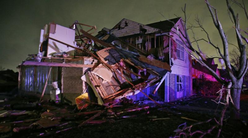 Five people were killed by flooding and winds in Arkansas (Photo: AP)