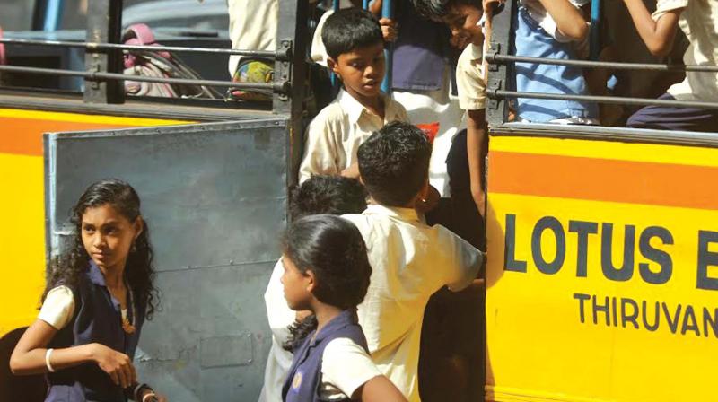 Students boarding a school bus in Kozhikode on Wednesday. (Photo: DC)