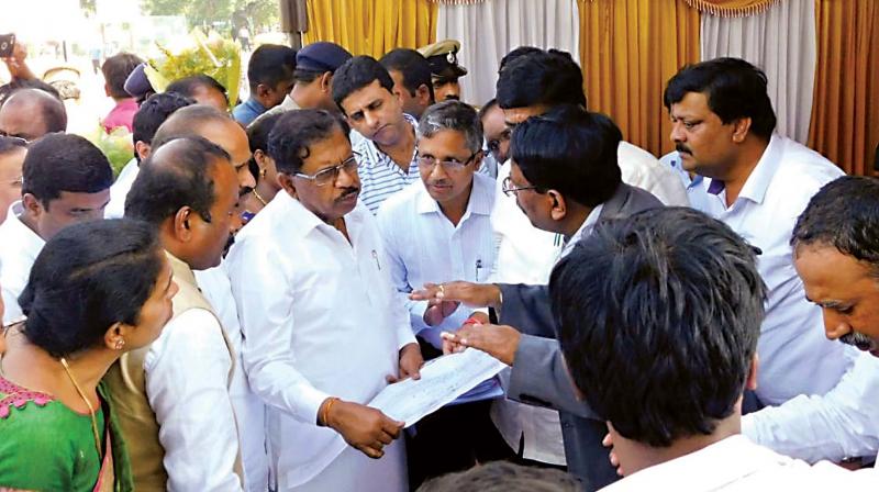 Deputy Chief Minister Dr. G Parameshwar inspects various developmental works during his city rounds in Bengaluru on Monday. (Photo:KPN)