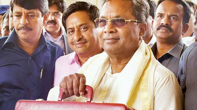 A file photo of Chief Minister Siddaramaiah arriving to present one of his earlier state Budgets