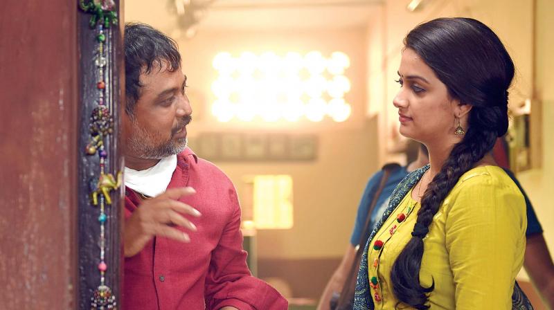 Keerthi Suresh with director Lingusamy on the sets of Sandakozhi 2.