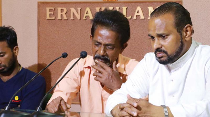 Kin of missing relatives hold a press conference at Ernakulam Press Club on Saturday along with Fr. Johnson Pankiyath.