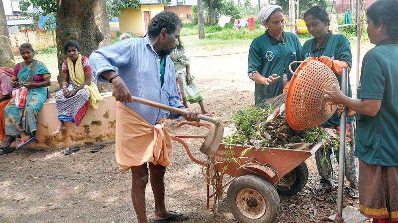 Cleaning work in progress in a relief camp at Pathalam Govt. School in Kochi on Saturday. (Photo: UNOJ NINAN MATHEW)