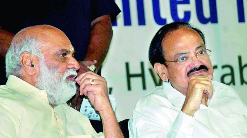 Union minister M. Venkaiah Naidu speaks to the media along with film-maker K. Raghavendra Rao in Hyderabad on Saturday.  PTI