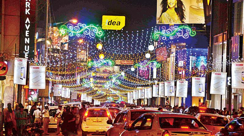 Brigade Road lit up for Chrstimas and New Year celebrations in Bengaluru on Sunday. (Photo: Shashidhar B.)