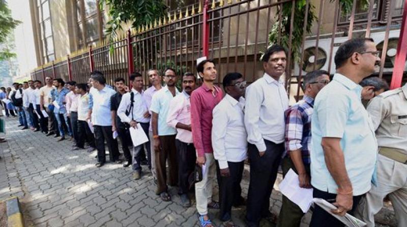 People queue up to change their old currency notes. (Representational Photo: PTI)