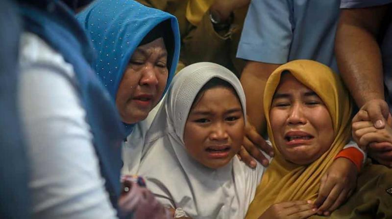 Family members of the crashed Indonesian Lion Air JT-610 react at Pangkal Pinang airport, in Bangka Belitung province on October 29, 2018. - An Indonesian Lion Air plane carrying 188 passengers and crew crashed into the sea on October 29, 2018, officials said, moments after it had asked to be allowed to return to Jakarta. (Photo: AFP)