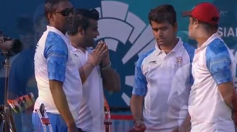 The trio of Abhishek Verma, Aman Saini and Rajat Chauhan were slow to get off the blocks before getting their act together to prevail 57-57, 56-57, 55-58, 59-58 in the four-set encounter. (Photo: Twitter / Team India)