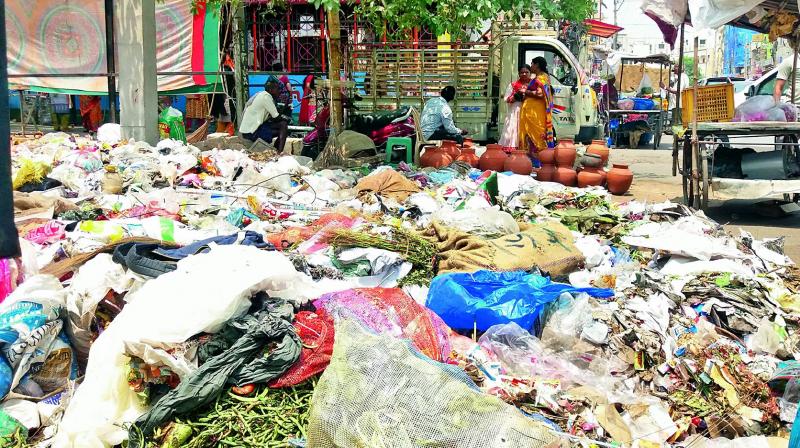 A pile of garbage lies at a junction in the tech zone in the city on Wednesday.