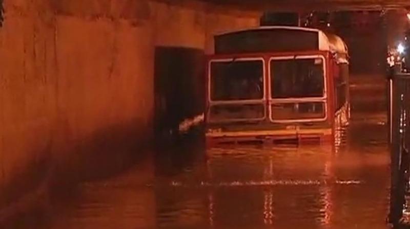 Since Tuesday, Mumbai is witnessing heavy rainfall accompanied by thunder and lightning which has led to water-logging in many areas. (Photo: ANI | Twitter)