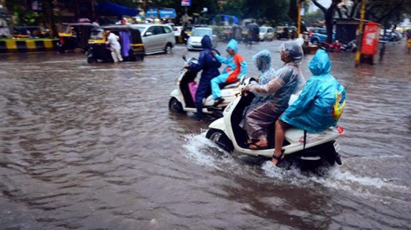 Since Tuesday, Mumbai is witnessing heavy rainfall accompanied by thunder and lightning which has led to water-logging in many areas. (Photo: PTI)