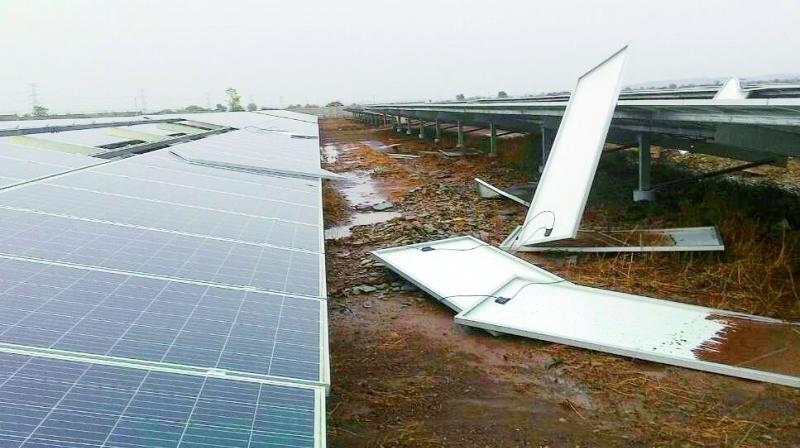 Solar panels blown away by heavy winds lie scattered in Kurnool on Tuesday. (Photo: DC)