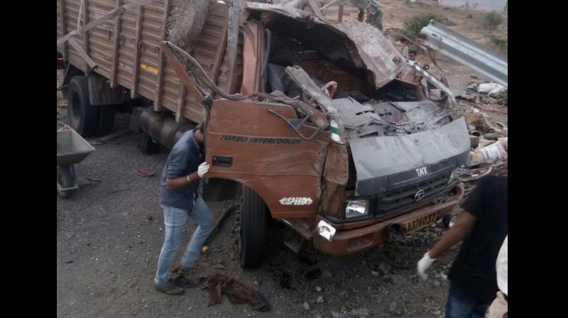 The truck, carrying construction labourers from Bijapur district in Karnataka, was going towards Pune when it met with the accident around 4.30 am on the Mumbai-Bengaluru highway, Sataras Superintendent of Police Sandeep Patil said. (Photo: Twitter | ANI)