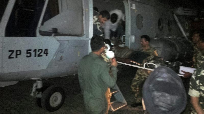 Injured CRPF jawans being airlifted to Raipur by an IAF chopper for treatment on Monday follwing a Maoist attack in Sukma district. (Photo: PTI)