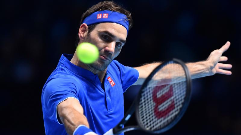 Federer and Anderson both ended up with two wins in the Lleyton Hewitt group but the Swiss grabbed first place on the head-to-head record  meaning he is likely to avoid world number one Novak Djokovic in Saturdays last four. (Photo: AFP)