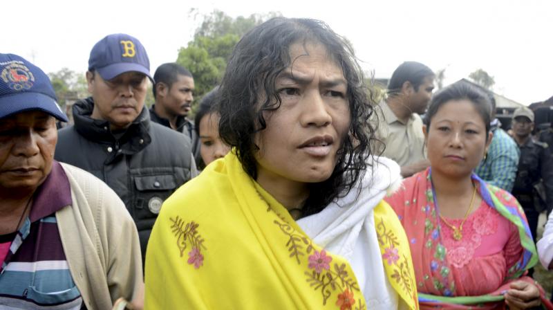 Human rights activist Irom Sharmila, who last year ended her 16-year long fast arrives to cast her vote at a polling booth in Khurai, Imphal, Manipur. (Photo: PTI)