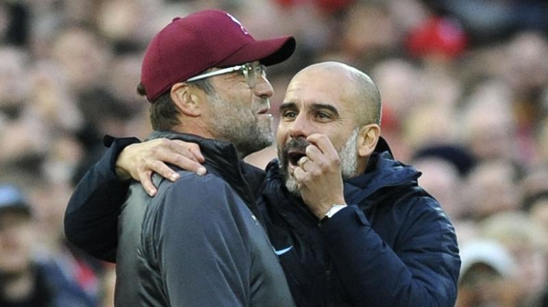 Liverpool preserved their unbeaten Premier League record as Jurgen Klopps side secured a 0-0 draw against Pep Guardiolas Manchester City at Anfield. (Photo: AP)