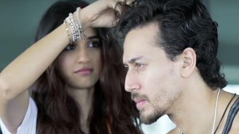 A screenshot from the video of Tiger and Disha.