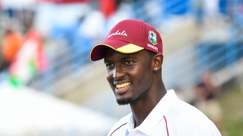 Holders five wickets haul has lifted him four places to a career-best sixth position in the Test rankings after the Windies scored an impressive 10-wicket win over England to take an unbeatable 2-0 lead in the three-match series. (Photo: AFP)