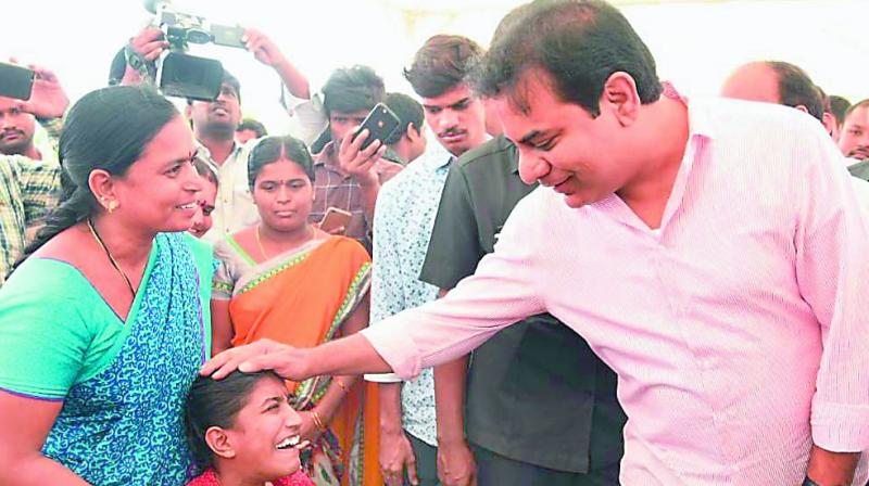 Minister K.T. Rama Rao meets a physically challenged person during the Mana Nagaram event at Nagole on Thursday. 	(Image: DECCAN CHRONICLE)