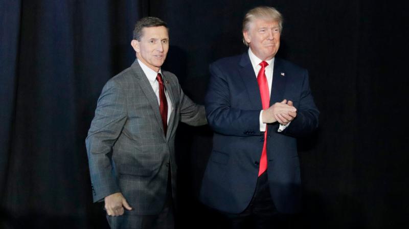 US President Donald Trump with former national security adviser Michael Flynn. (Photo: AP)