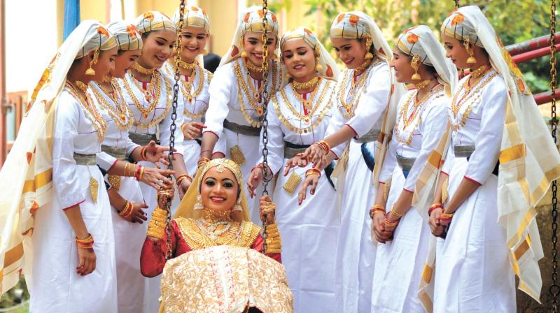 Students of Carmel CMI School, Palakkad, enjoy after their Oppana competition at CBSE state youth festival in Adimali on Saturday.