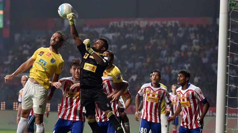Atletico de Kolkata and Kerala Blaster FC Footballers vie for the ball during ISL Match in Kolkata on Tuesday evening. (Photo: PTI)