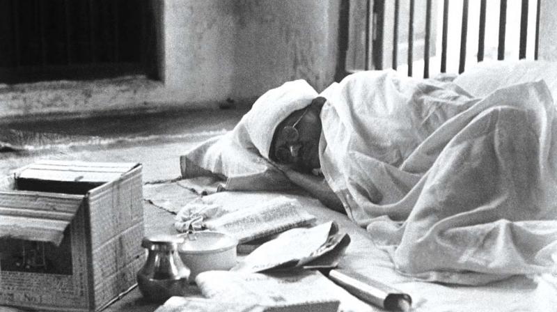 Gandhi sleeps on the floor- an image that will be  displayed at KGOU exhibition.