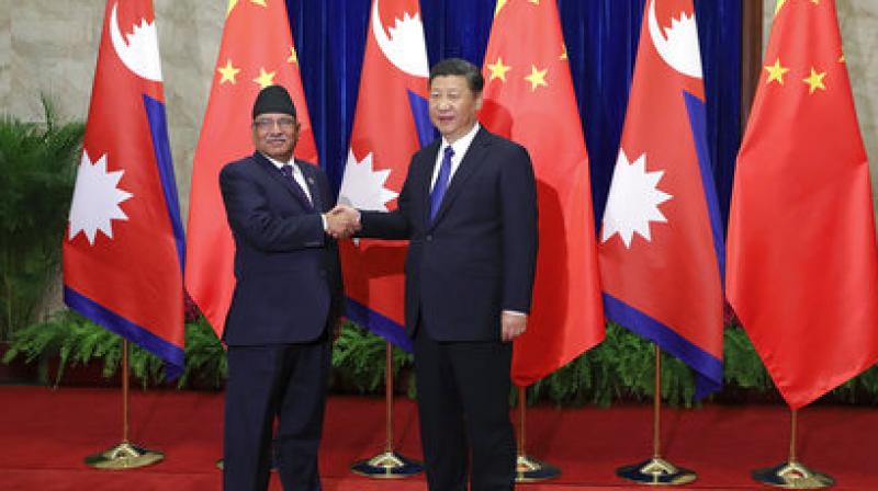 Nepalese Prime Minister Pushpa Kamal Dahal, left, and Chinese President Xi Jinping. (Photo: AP)