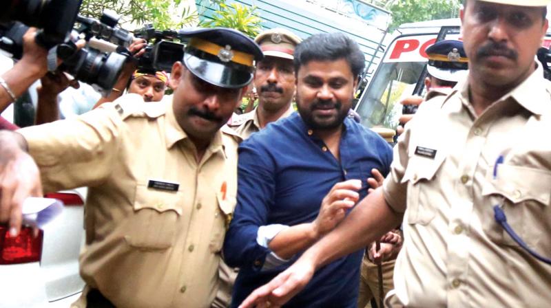 Actor Dileep being brought to the magistrates house in Angamaly on Tuesday. (Photo: DC)