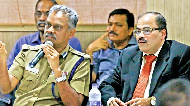 City police commissioner A K Viswanathan conducts meeting with banks representatives. (Photo: DC)