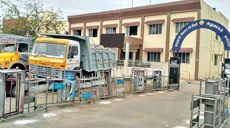 Seized trucks parked outside Tambaram tahsildar office. (Photo: DC)