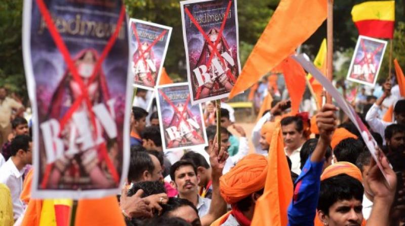 Violent protests by members of the Rajput community against the release of Sanjay Leela Bansalis controversial period drama Padmaavat were witnessed across Gujarat on Sunday, with agitators damaging buses and blocking roads. (Photo: PTI)