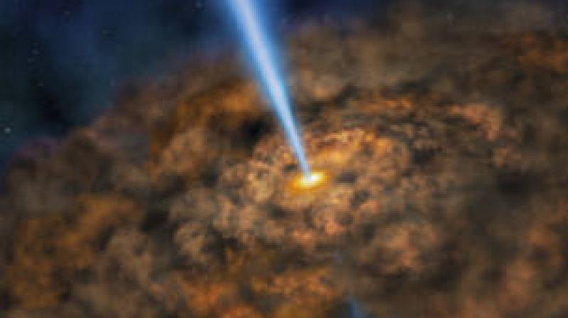 An illustration of the thick ring of dust that can obscure the energetic processes that occur near active black hole. (Photo:NASA)