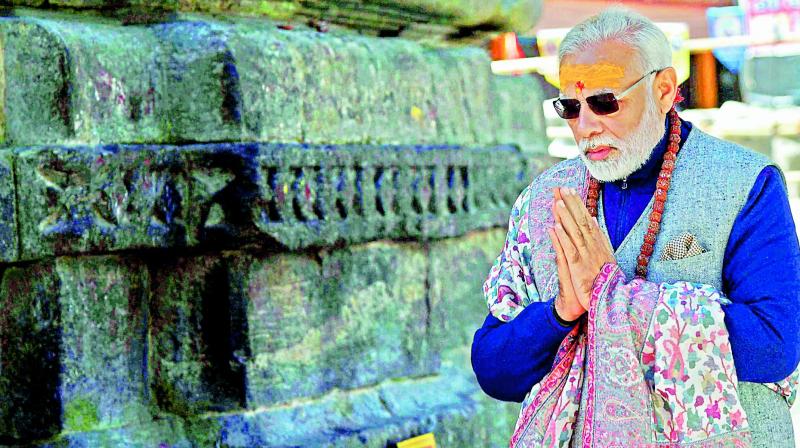 Prime Minister Narendra Modi does the parikrama of the Kedarnath temple on Friday. The temple will close on Saturday for the winter. (Photo: PTI)