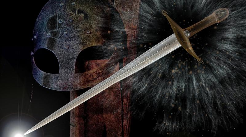 Young girl finds sword in lake where King Arthur threw Excalibur.
