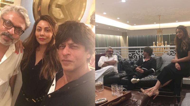 Sanjay Leela Bhansali meeting up with Shah Rukh Khan at Gauri Khans store.