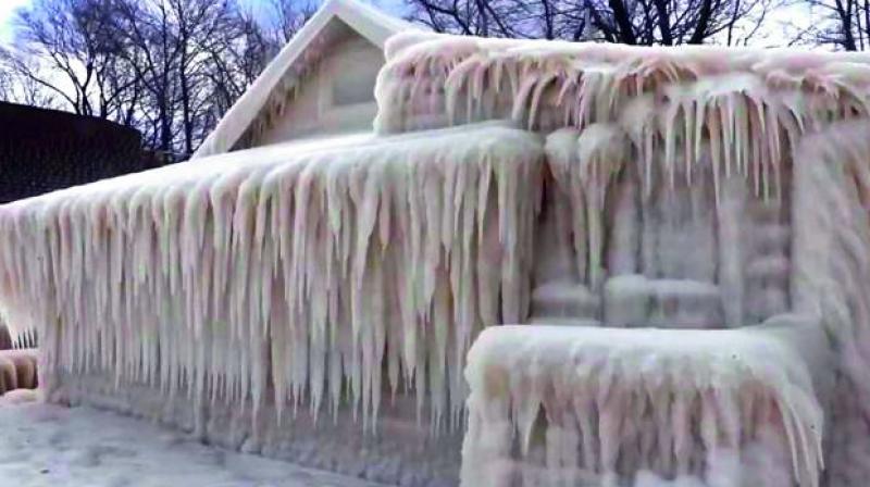 Cold weather in New York state left one house completely encased in ice. Winter Storm Stella unleashed its fury on northeastern US, dropping snow and sleet.(Photo: via web)