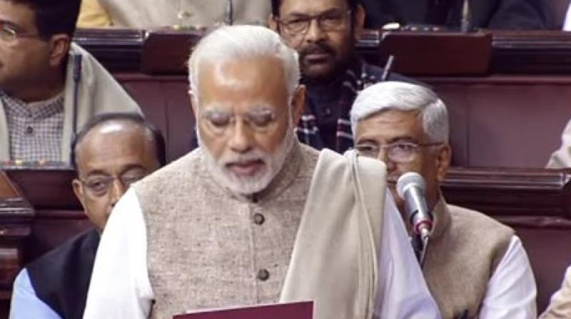 Prime Minister Narendra Modi addresses the Rajya Sabha on Friday. This Winter Session of Parliament will have 14 sittings, seven less than last year. (Photo: ANI/Twitter)