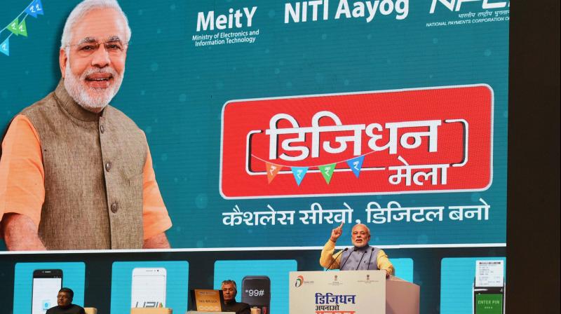 Prime Minister Narendra Modi addressing at the launch of a new mobile app BHIM to encourage e-transactions during the Digital Mela at Talkatora Stadium in New Delhi. (Photo: PTI)