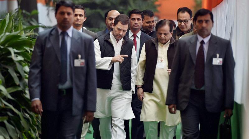 Congress Vice President, Rahul Gandhi with party leader Ahmed Patel arrive to attend the 132nd foundation day of Indian National Congress at AICC in New Delhi on Wednesday. (Photo: PTI)