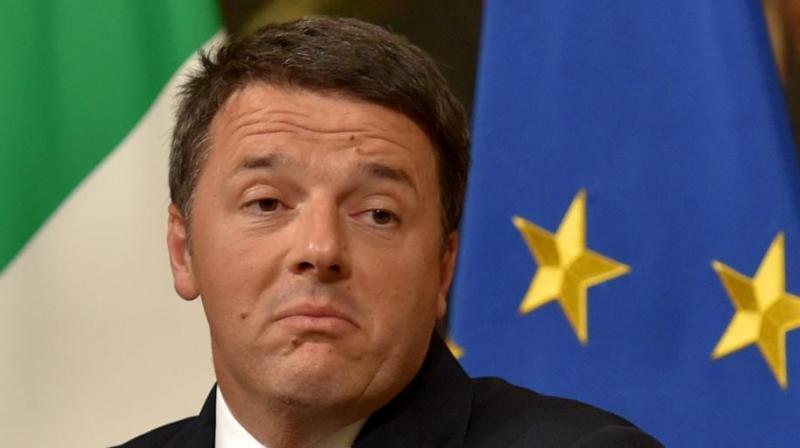 talys Prime Minister Matteo Renzi announces his resignation during a press conference at the Palazzo Chigi following the results of the vote for a referendum on constitutional reforms, on December 4 in Rome. (Photo: AFP)