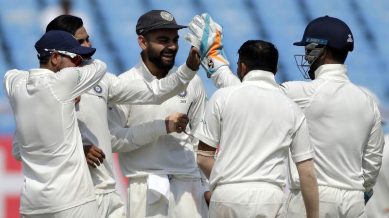 Virat Kohli-led India dominated the game, amassing 649 for nine in their first innings before bowling out the West Indies twice on day three, to take a 1-0 lead in the two-match series. (Photo: AP)