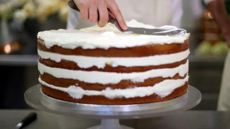 The lemon sponge which has been specially developed for the couple will be drizzled with elderflower cordial (Photo: AFP)