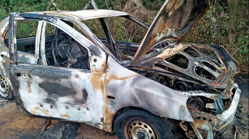 The mangle remains of the car that was found in Palar River bed near Mamandur. (Photo: DC)