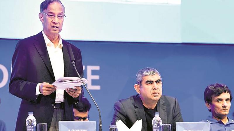 Infosys board chairman R Seshasayee (standing) had on Friday said it was committed to returning shareholders money. (Photo: File/PTI)