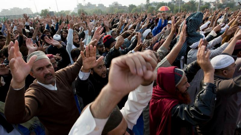 Pakistans law minister Zahid Hamid was accused by the protesters of blasphemy after a reference to the Prophet Muhammad was left out of a revised version of the electoral oath. He called it a clerical error. (Photo: AP)
