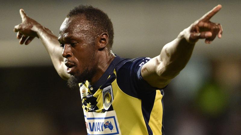 What is certain is that Bolt will not be turning out for the Mariners when they open their season at Brisbane Roar on Sunday, and most probably not until the New Year at the earliest. (Photo: AFP)