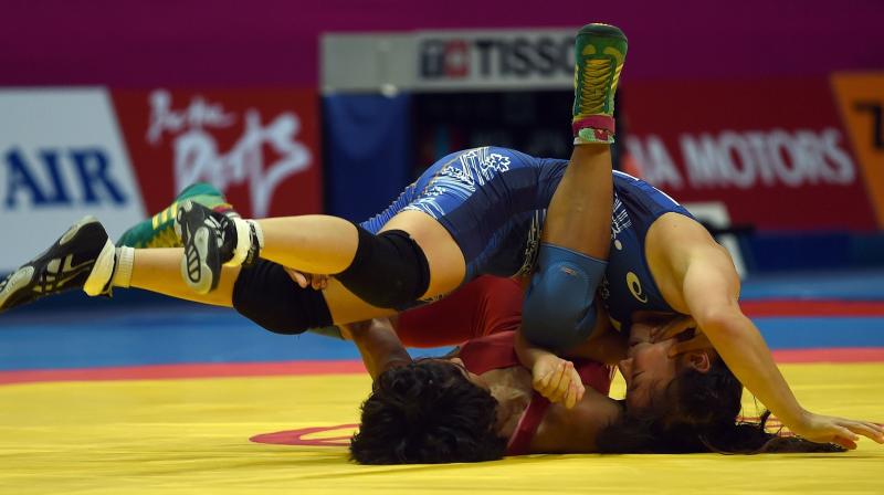Wrestler Sweety Malik, who has played three international tournaments, said that apart from consuming a lot of time, long hair easily get damaged as they practice in the mud field. (Photo: AFP)