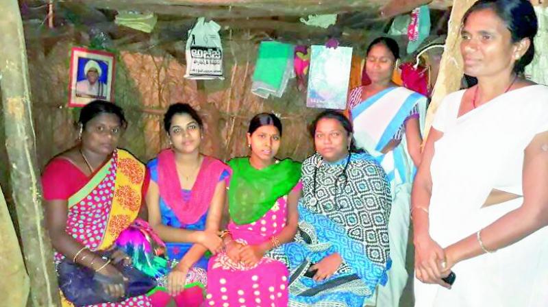 A team of doctors spend time with a pregnant lady at Vencharami village. (Photo:  DC)